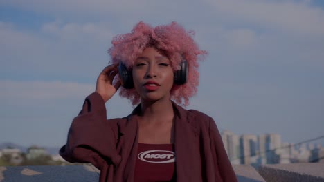 girl female woman listening to music in headphones