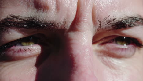 close-up of a person's face with a strained expression