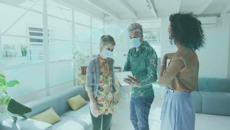 animation of spinning human brain over businesswomen wearing face masks