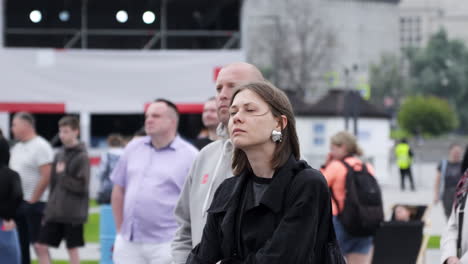 couple watching an event in the city