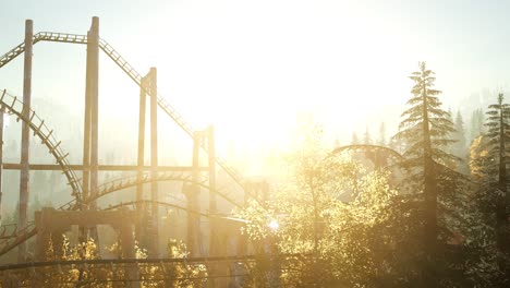 old-roller-coaster-at-sunset-in-forest