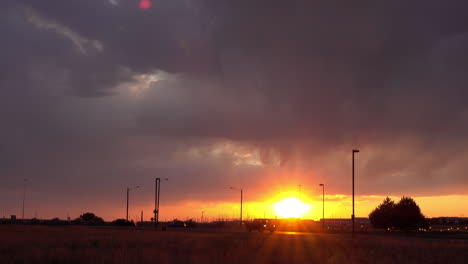 sunset and clouds with car traffic.
