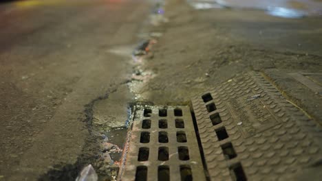 urban street drain at night