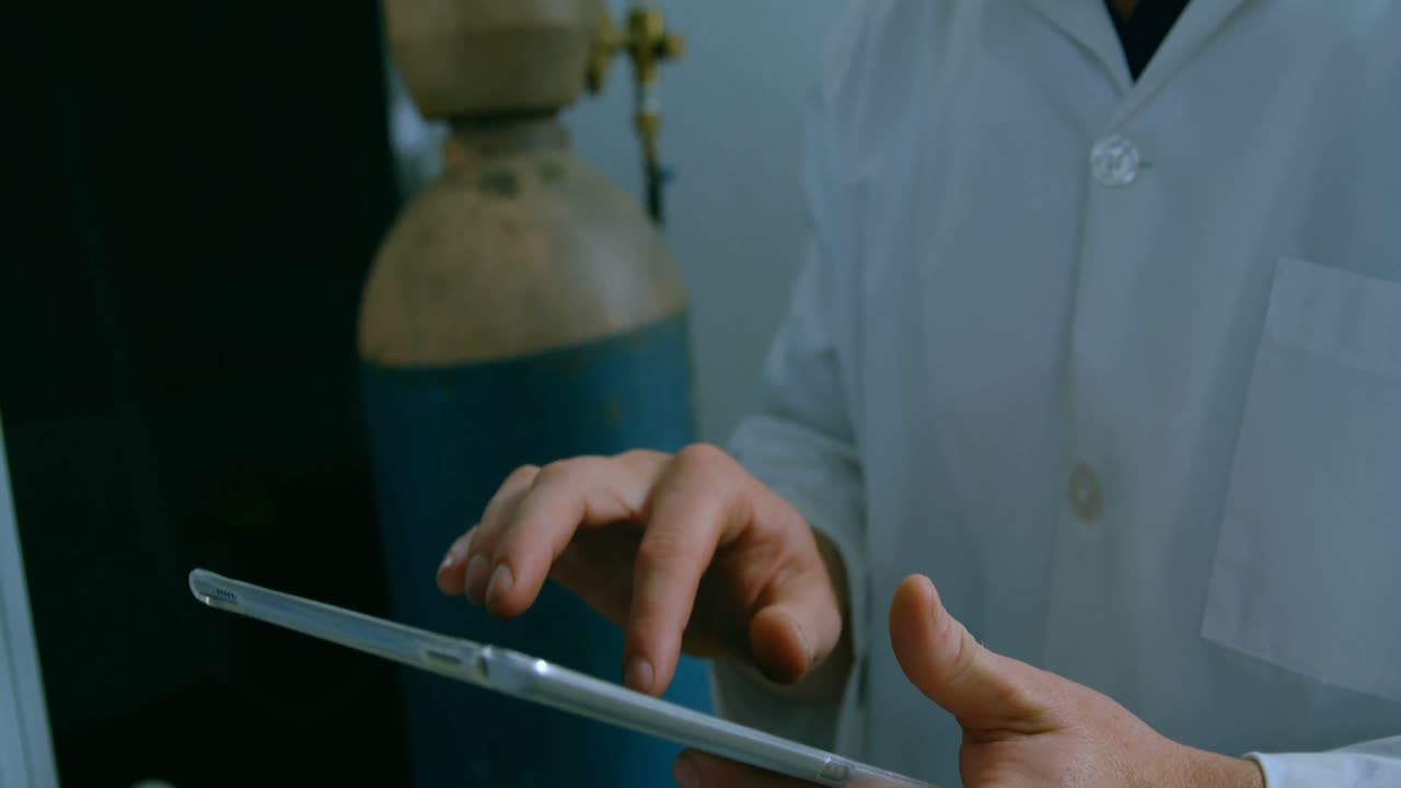 Robotic engineer using digital tablet in warehouse 4k