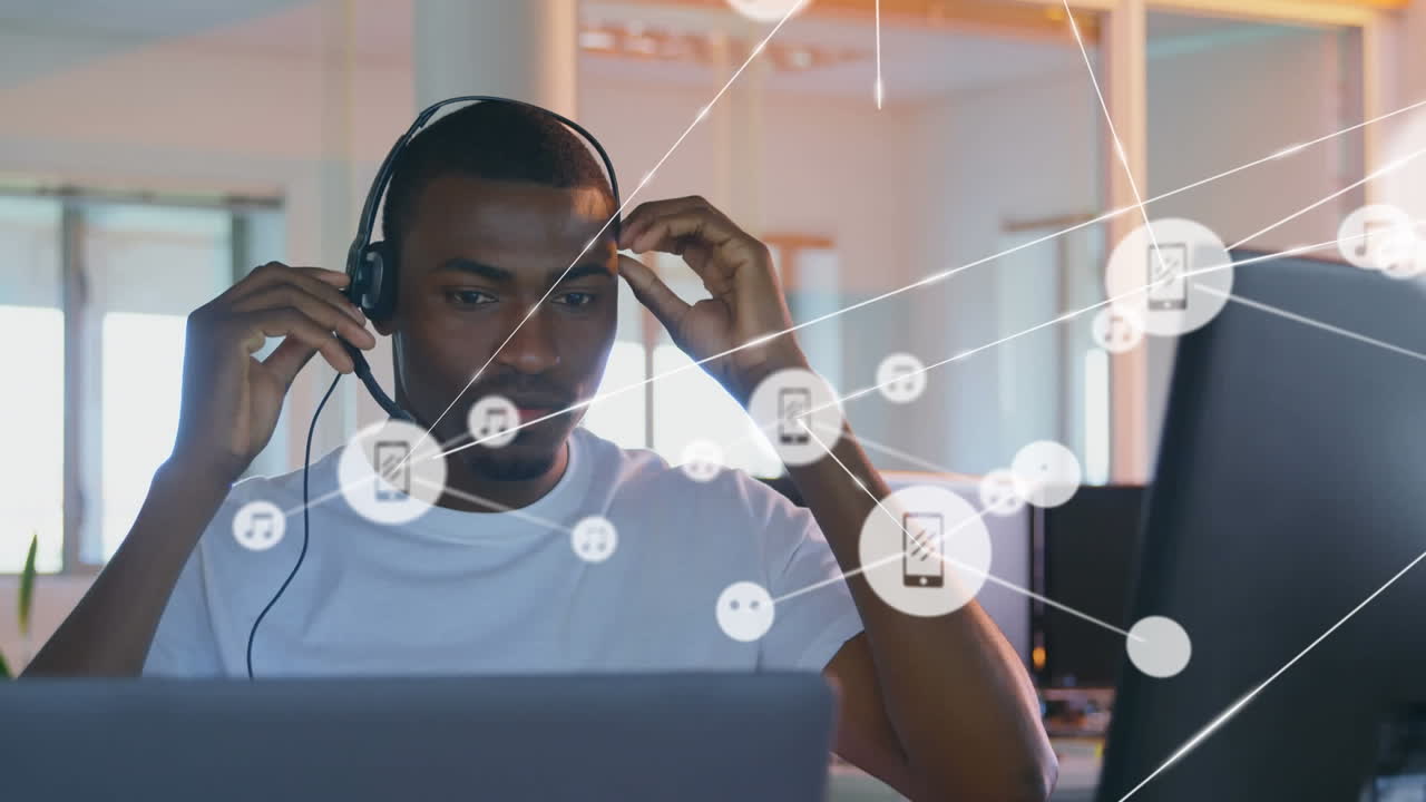 Animation of networks of connections and businessman wearing phone headset