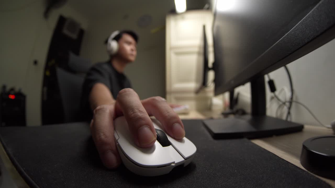 Fisheye POV Close Up Detail of Hand on White Gaming Mouse During Intense PC Gameplay