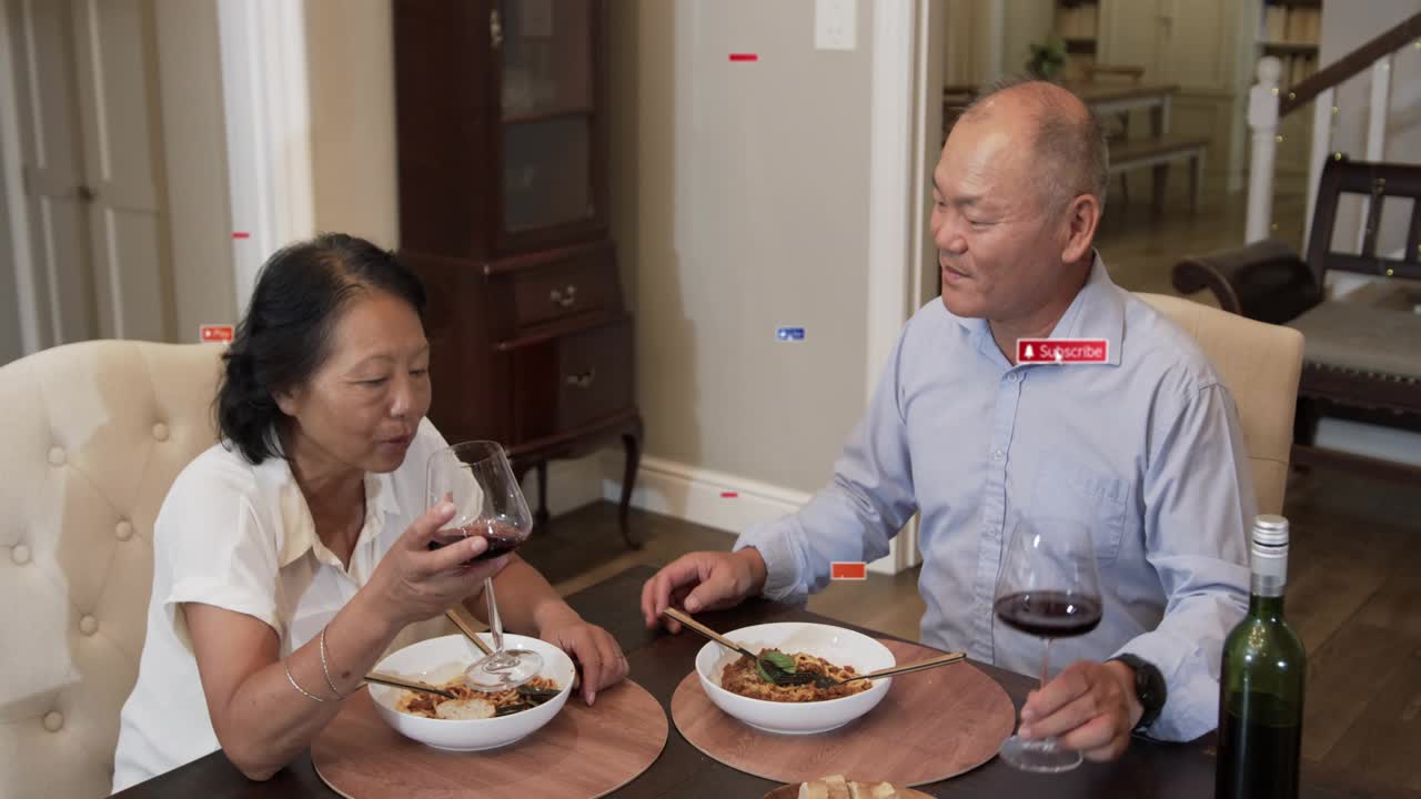 Man starting pouring wine, woman raising glass, partners sharing food, overlays appearing around