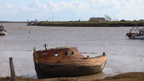 boat wreck on the shore at orford on the suffolk coastline, united kingdom