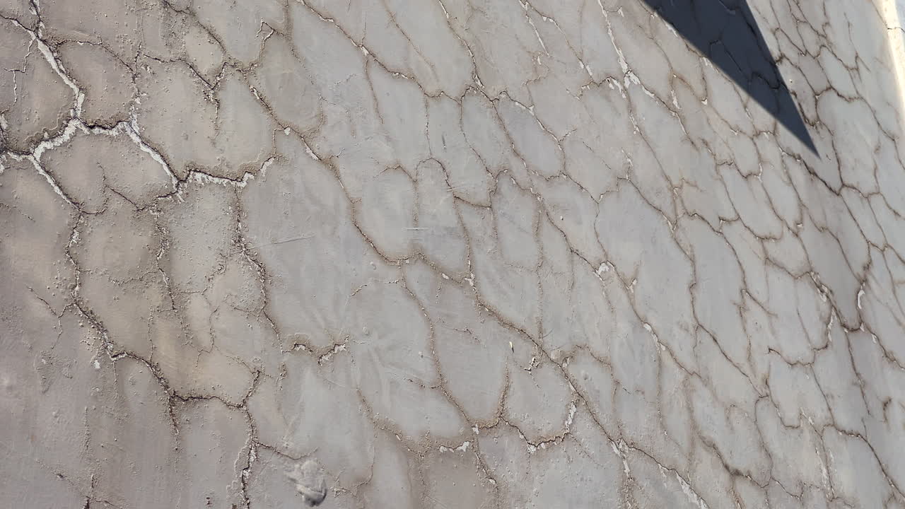 Close up of cracked paint on old wall, grunge texture background for design use