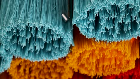 vibrant tassels sway gently, showcasing intricate textures and vivid with dynamic lighting and close-up focus