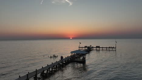 walking a dock on mobile bay, alabama