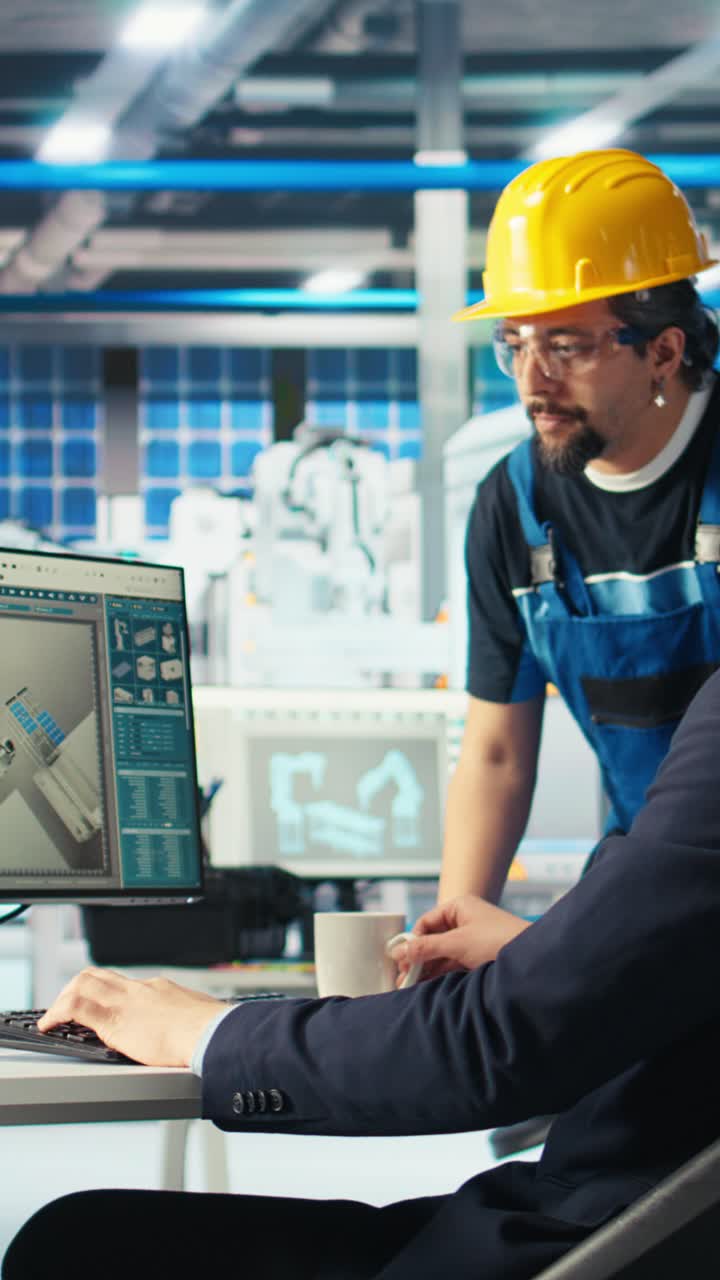 Vertical Video Photovoltaics Factory Researcher Telling Worker How To Improve Efficiency