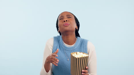 Face,-funny-and-black-woman-with-popcorn