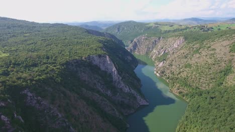 straight part of river uvac in europe serbia, aerial forward slow