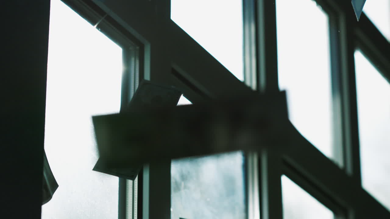 Money Hanging from a Window
