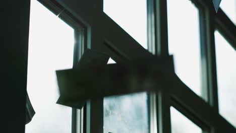 money hanging from a window
