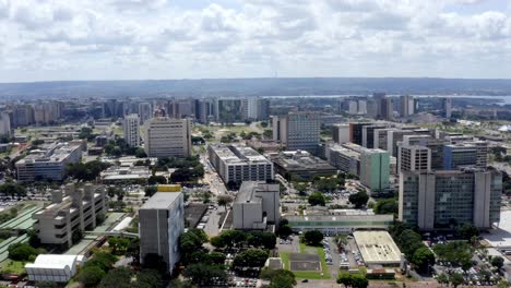 city dominated by bold, geometric structures and broad, sweeping avenues