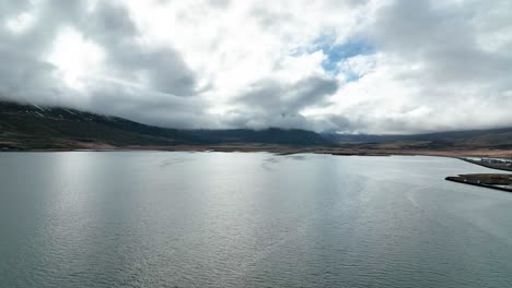 Flying-Towards-Old-Airport-Runway-In-Faskrudsfjordur,-East-Iceland---drone-shot