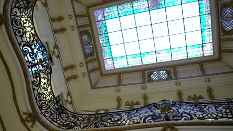 hand held shot inside subercaseaux palace santiago, chile, european architecture heritage in south america, stained glass ceiling details