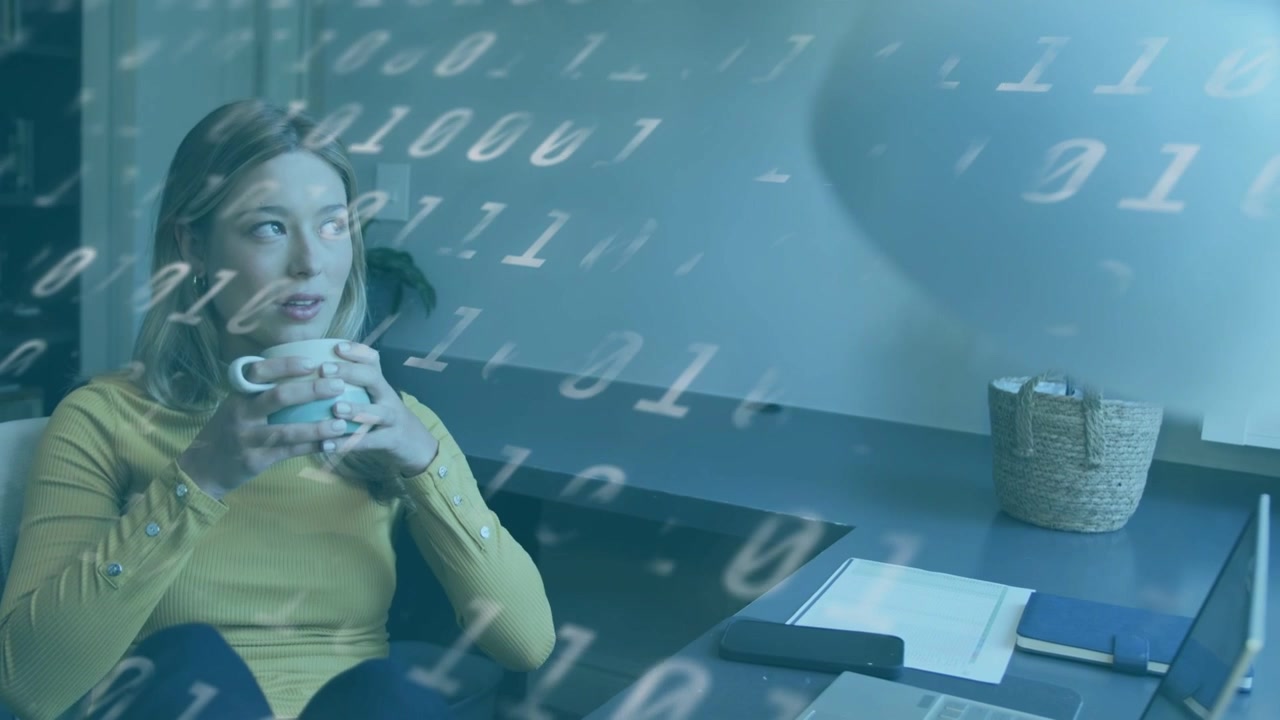 Woman holding white mug sipping, scanning PC, gazing out window, binary overlay tinting scene tech
