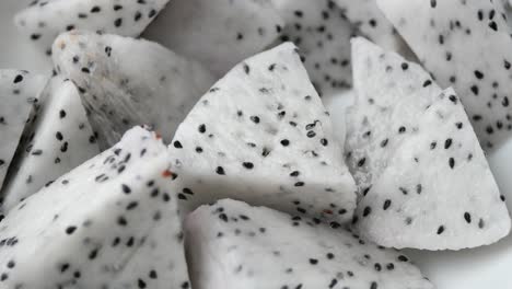 slice of dragon fruit on a chopping board,