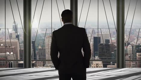 rear view of businessman standing in office