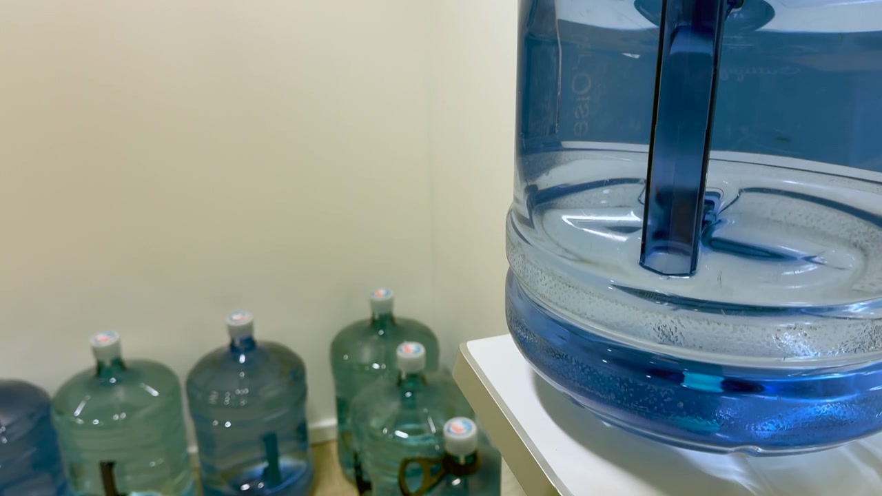 Large water gallon jugs ready for office water dispenser