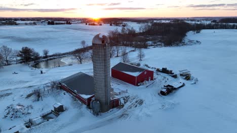 large tall silo and red barn