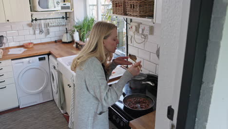 woman cooking in kitchen