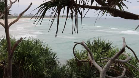 sequential frames showing progressive beach erosion