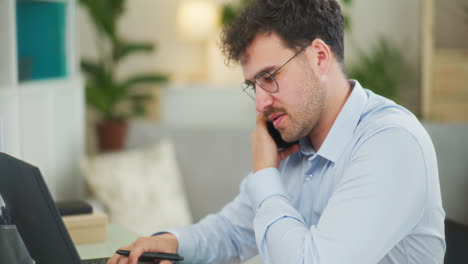 businessman takes order by phone