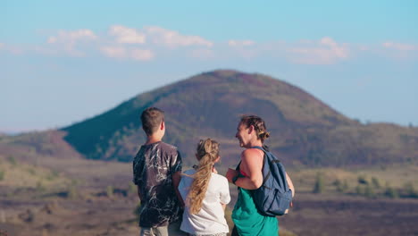 family enjoying scenic mountain view while hiking
