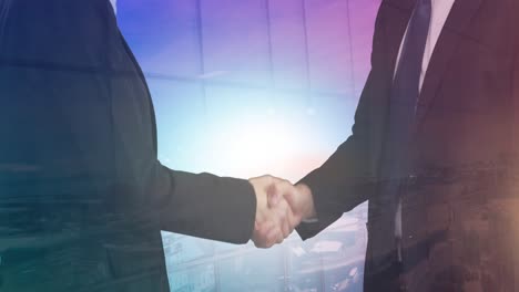 animation of businessman and businesswoman shaking hands over cityscape