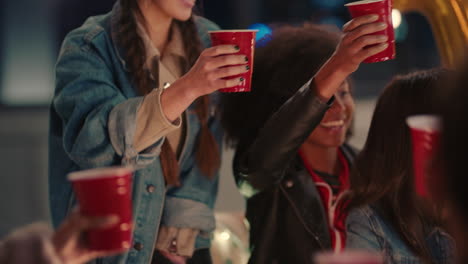 diverse-group-of-friends-celebrating-birthday-party-making-toast-enjoying-celebration-having-fun-drinking-alcohol-sharing-friendship