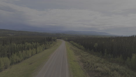 tranquil wilderness drive on the alaska highway.