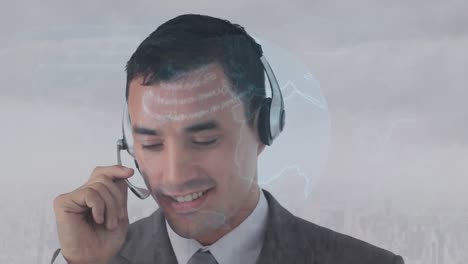 Animation-of-globe-over-business-man-using-phone-headset