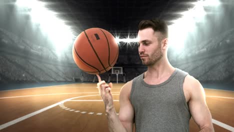 basketball player spinning a basketball on his hand