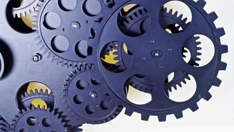 close up shot of  black gear cogs rotating