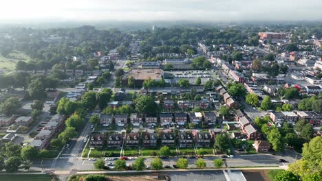 High-aerial-truck-shot-of-city-outskirts