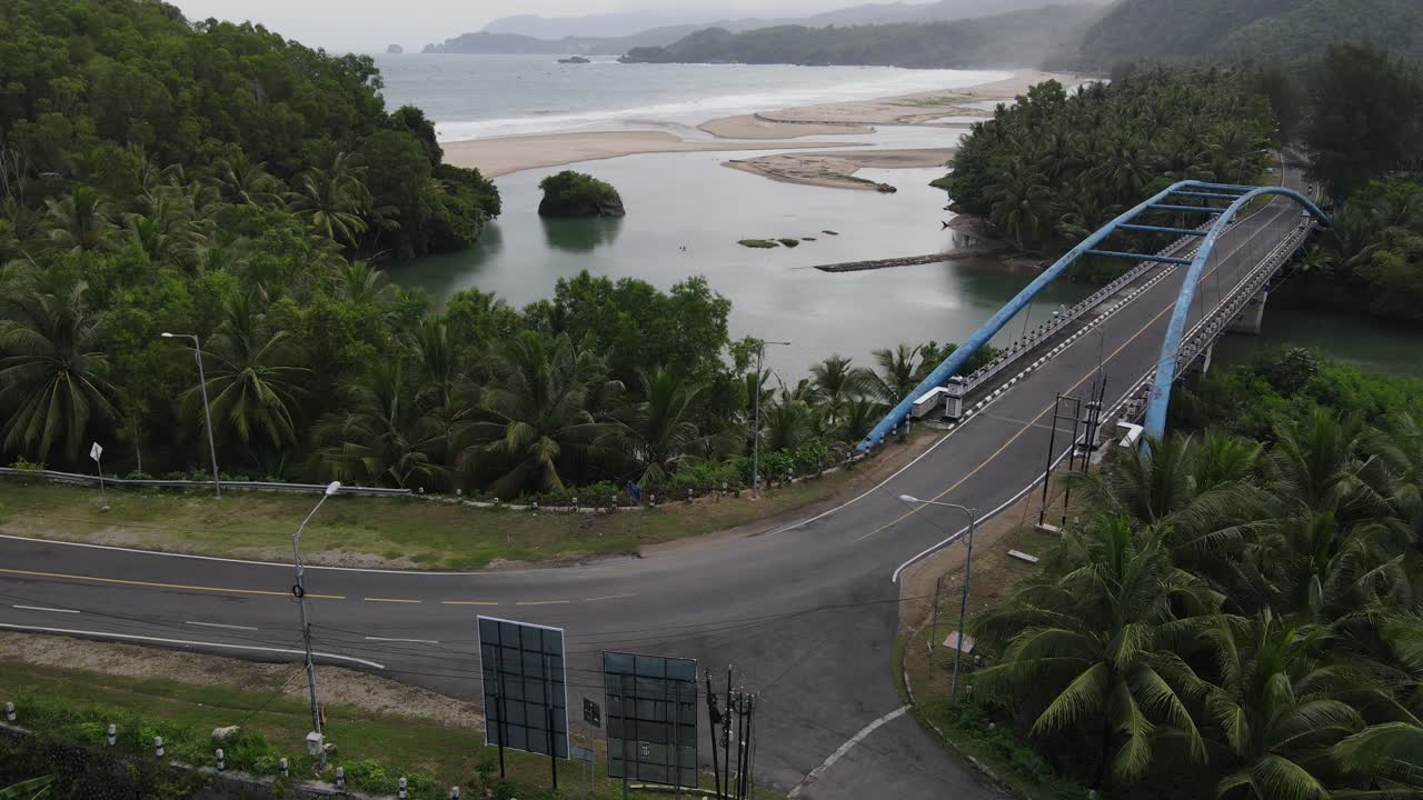 Aerial view of the Soge blue bridge, which is one of the tourist icons of Pacitan city, East Java, Indonesia