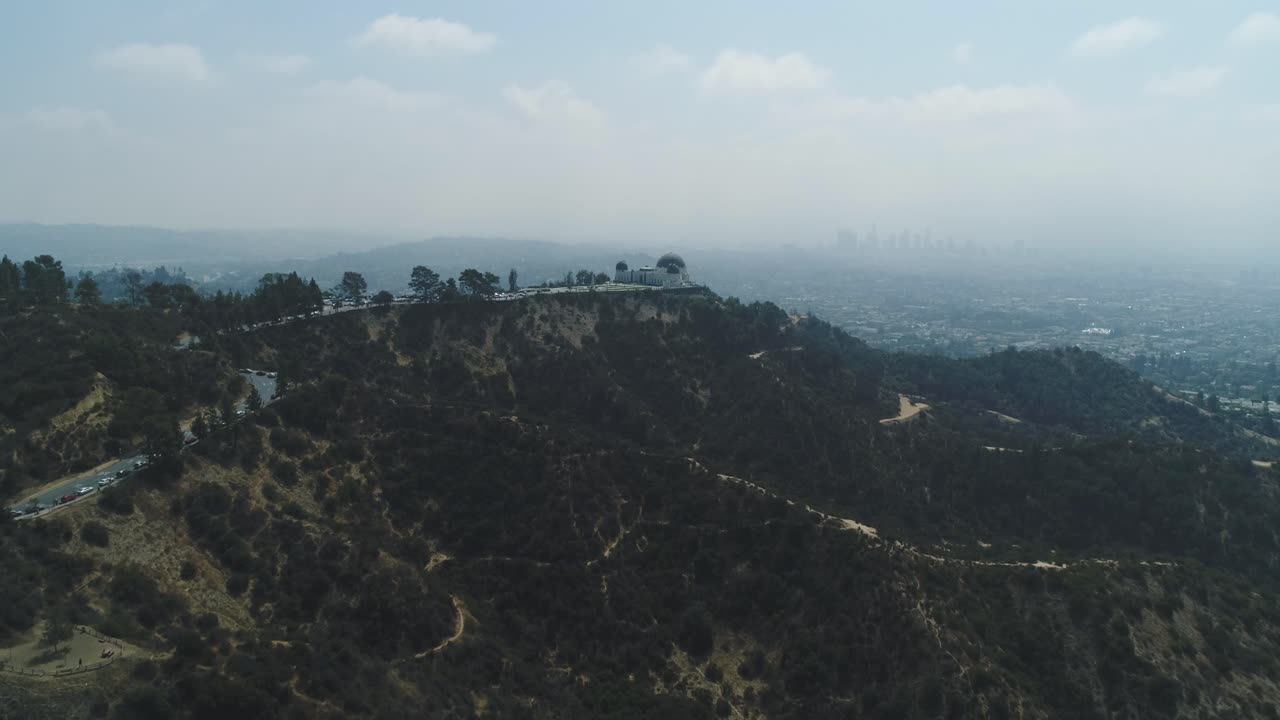4K 60 FPS Cinematic Drone footage of Griffith Park overlooking the Hollywood Sign in Los Angeles, CA.