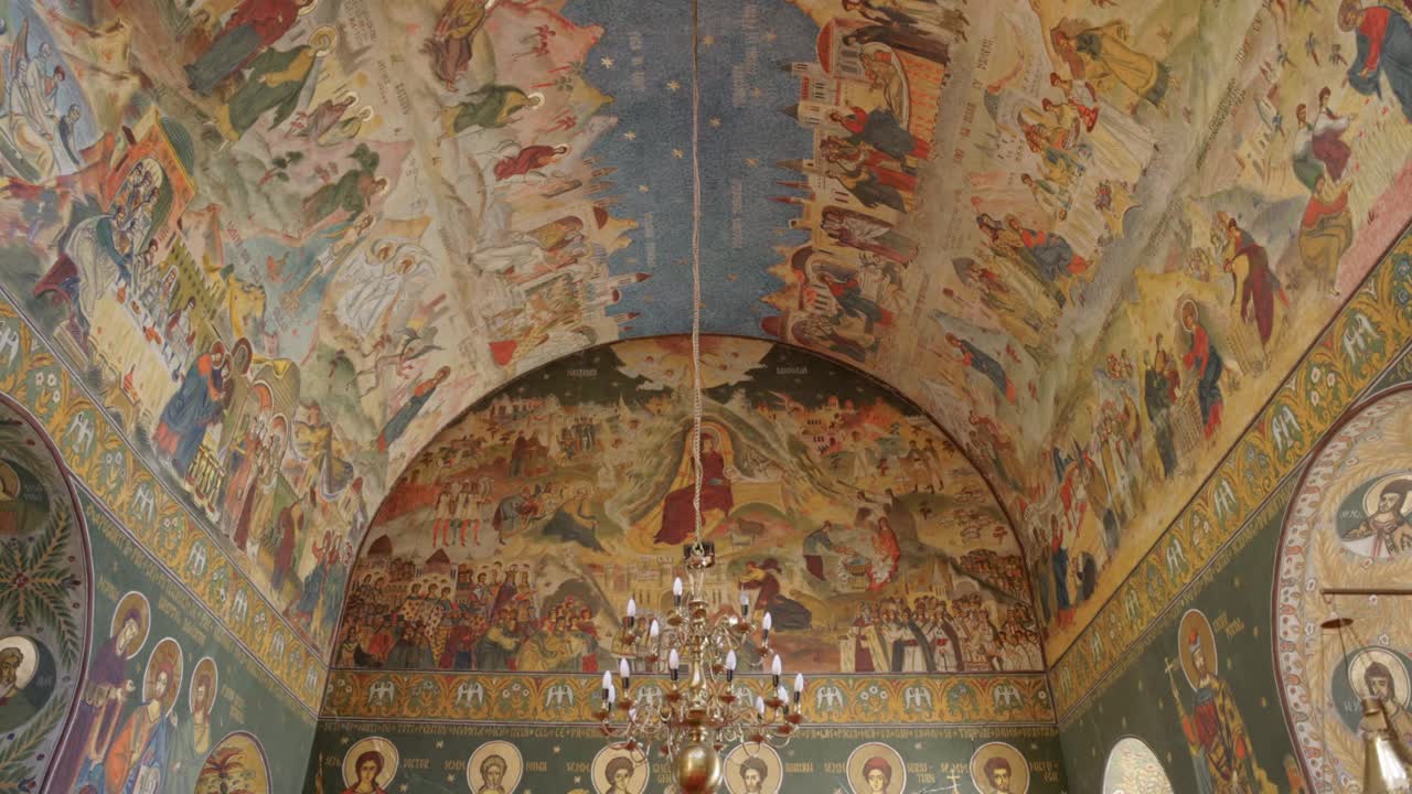 Intricate Religious Fresco On The Ceiling Of An Orthodox Church. Low Angle Shot