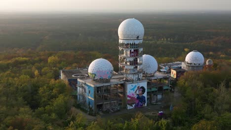 perfect aerial view flight panorama overview orbit drone of radom in
autumn forest at morning sunrise, devil's mountain in woods berlin october 2022