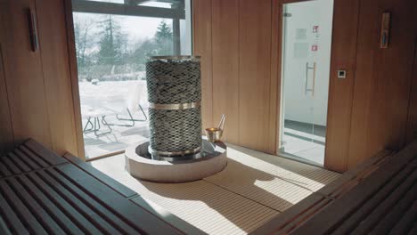 finnish sauna with a modern heating element in a hotel spa center