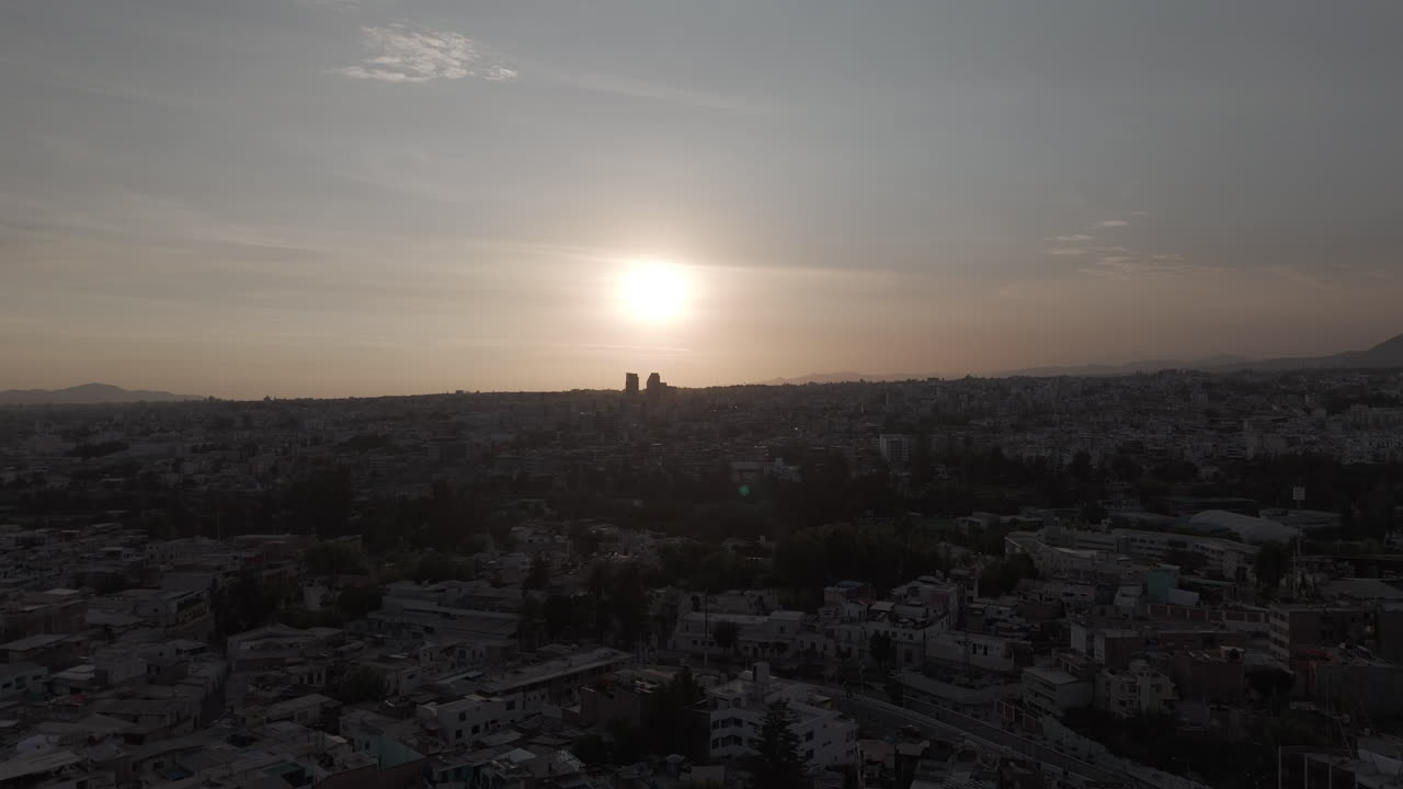 Sideways drone shot above Arequipa Peru during sunset with a view above the city LOG