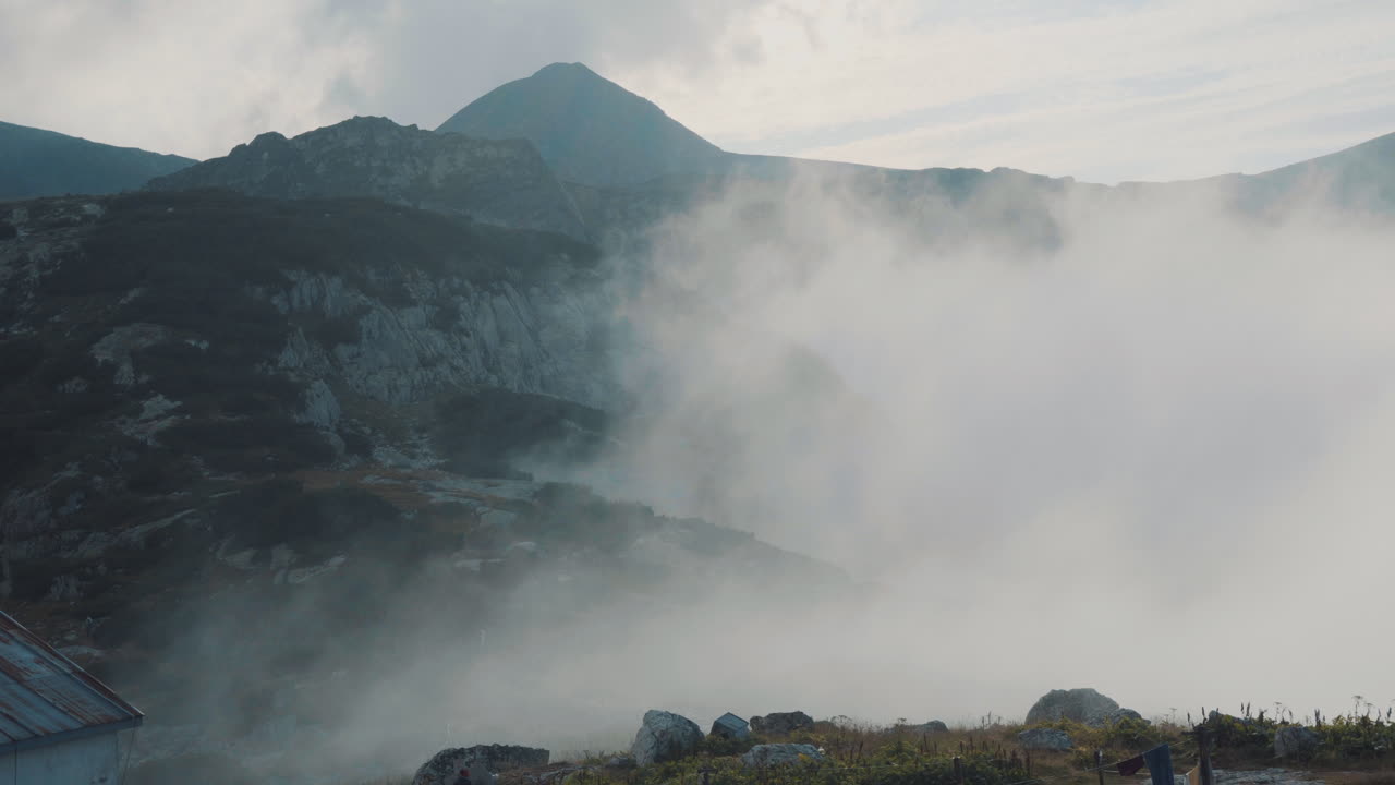 Low clouds in the mountains. Rila lakes in the Rila Mountains in Bulgaria