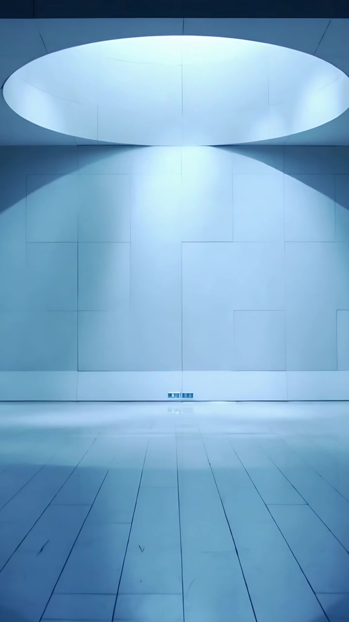 Vertical video: Shifting light through skylight creating circular spotlight on wall and tiled floor