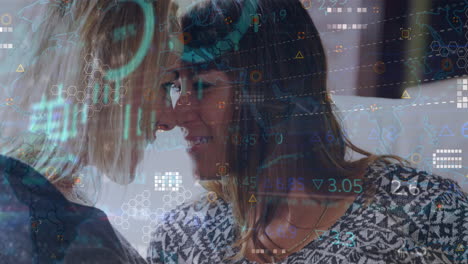 animación del procesamiento de datos sobre una pareja de lesbianas caucásicas