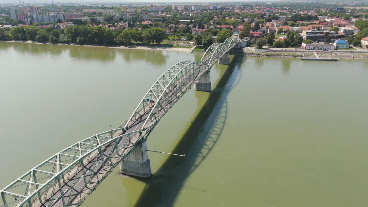 Scenic aerial view of Hungary’s Mária Valéria Bridge, spanning the Danube River with Slovakia visible across the water