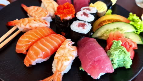 colorful platter of assorted japanese sushi and sashimi served in ubud, bali